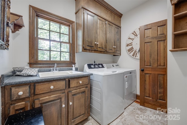 10215 Balmoral Cir, Charlotte, NC 28210 - laundry room featuring cabinet space, washer and dryer, and light tile patterned floors