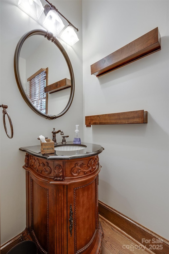 10215 Balmoral Cir, Charlotte, NC 28210 - bathroom featuring wood finished floors and vanity