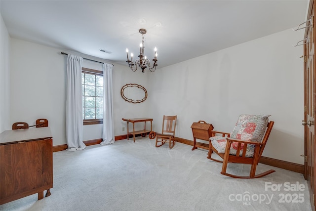 10215 Balmoral Cir, Charlotte, NC 28210 - living area featuring a chandelier and carpet flooring