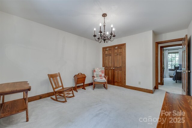 10215 Balmoral Cir, Charlotte, NC 28210 - living area with a chandelier and carpet flooring