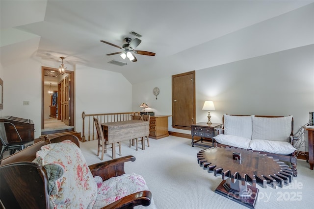 10215 Balmoral Cir, Charlotte, NC 28210 - living room with vaulted ceiling, ceiling fan, and light carpet