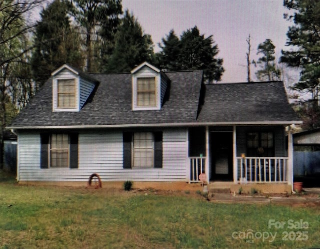 5816 Rocky Mount Ct, Charlotte, NC 28214 - cape cod-style house featuring a porch and a front lawn