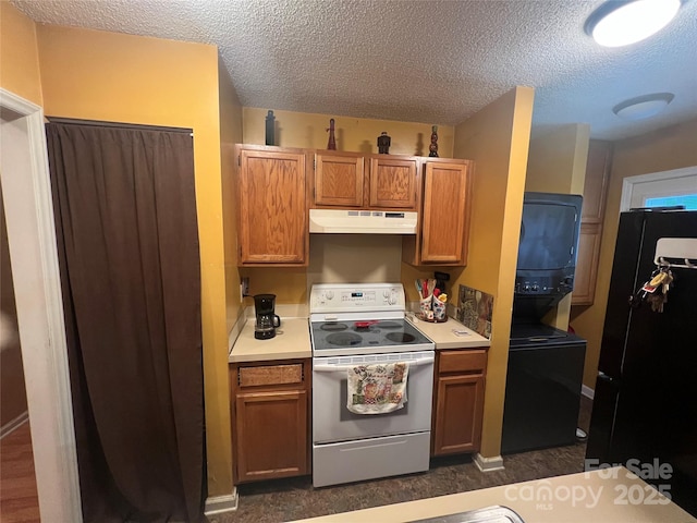 5816 Rocky Mount Ct, Charlotte, NC 28214 - kitchen with white range with electric cooktop, under cabinet range hood, freestanding refrigerator, light countertops, and a textured ceiling
