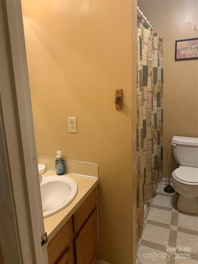 5816 Rocky Mount Ct, Charlotte, NC 28214 - bathroom with toilet, vanity, curtained shower, and tile patterned floors