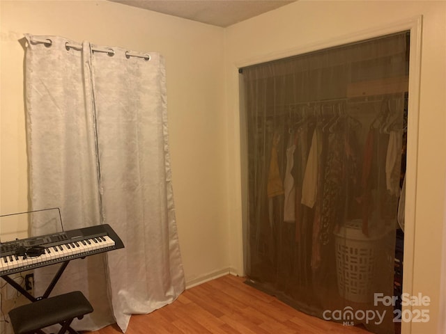 5816 Rocky Mount Ct, Charlotte, NC 28214 - bedroom featuring wood finished floors and a closet