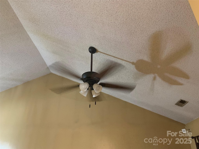 5816 Rocky Mount Ct, Charlotte, NC 28214 - detailed view of a textured ceiling and a ceiling fan