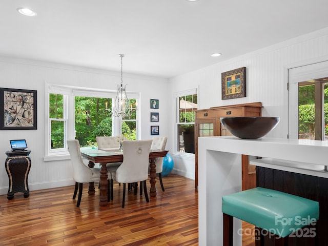 1165 Mountain Laurel Dr, Columbus, NC 28722 - dining area featuring wood-type flooring, plenty of natural light, ornamental molding, baseboards, and recessed lighting