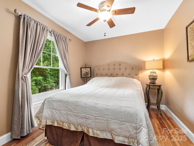 1165 Mountain Laurel Dr, Columbus, NC 28722 - bedroom featuring wood finished floors, baseboards, and ceiling fan