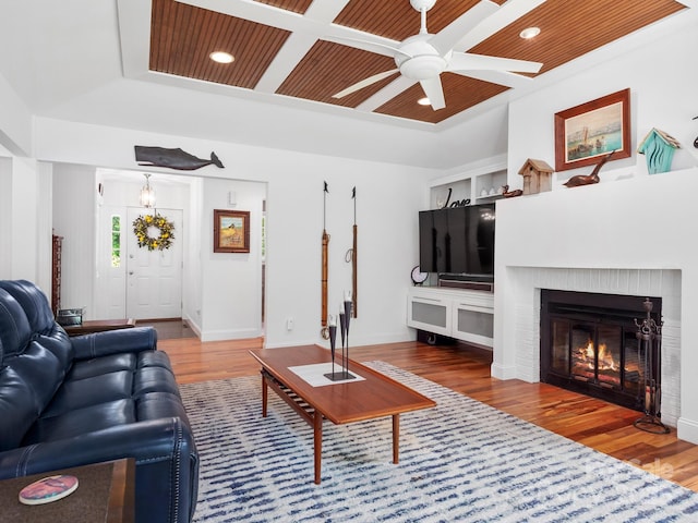 1165 Mountain Laurel Dr, Columbus, NC 28722 - living area featuring a ceiling fan, wood finished floors, recessed lighting, a fireplace, and baseboards