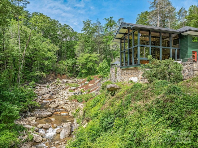 400 Kings Dr, Lake Lure, NC 28746 - view of yard with a sunroom and a view of trees