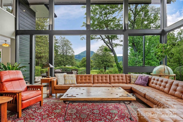 400 Kings Dr, Lake Lure, NC 28746 - living room featuring a mountain view and plenty of natural light