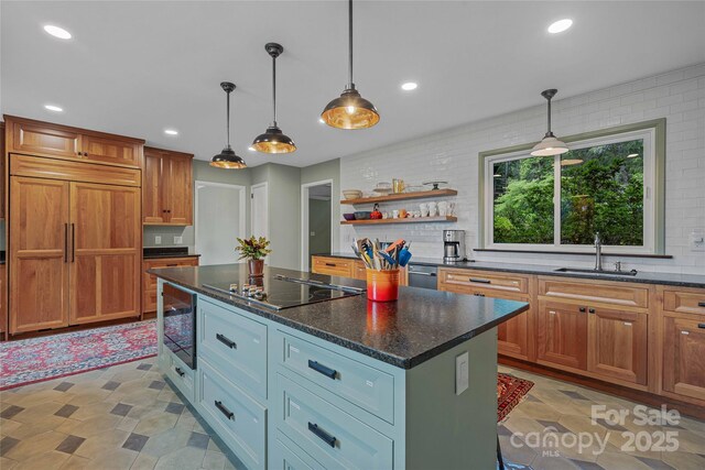 400 Kings Dr, Lake Lure, NC 28746 - kitchen featuring black electric stovetop, a sink, a kitchen island, open shelves, and recessed lighting