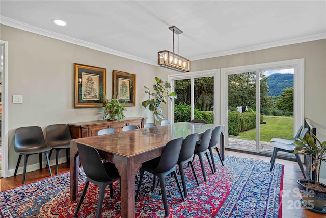 400 Kings Dr, Lake Lure, NC 28746 - dining space featuring crown molding, wood finished floors, baseboards, and recessed lighting