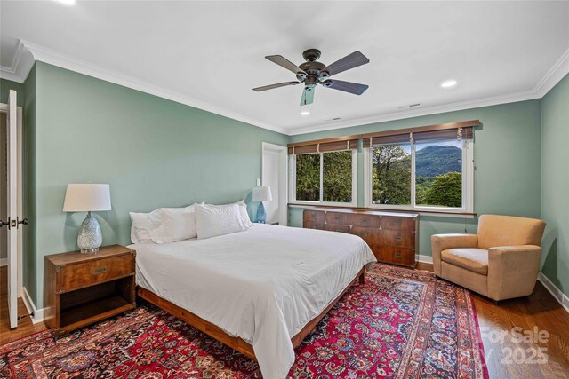 400 Kings Dr, Lake Lure, NC 28746 - bedroom with baseboards, wood finished floors, recessed lighting, ornamental molding, and a ceiling fan