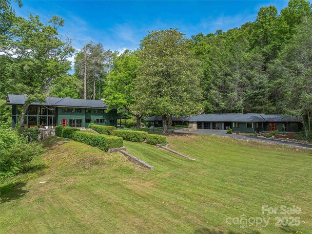 400 Kings Dr, Lake Lure, NC 28746 - view of grassy yard featuring asphalt driveway