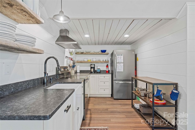 400 Kings Dr, Lake Lure, NC 28746 - kitchen with freestanding refrigerator, wall chimney range hood, open shelves, electric stove, and dark countertops