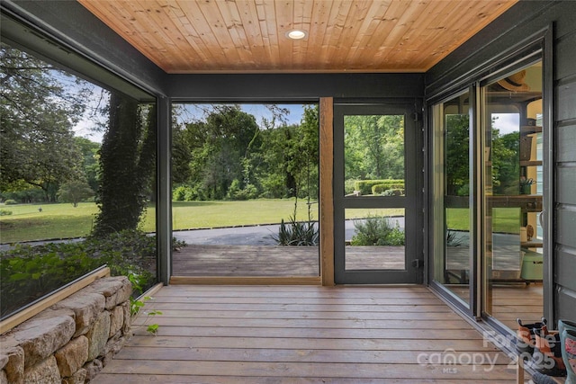 400 Kings Dr, Lake Lure, NC 28746 - unfurnished sunroom with view of wooded area