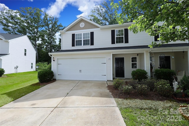 3349 Ellingford Rd, Charlotte, NC 28214 - traditional-style home with an attached garage, a front lawn, concrete driveway, and board and batten siding