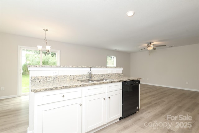 3349 Ellingford Rd, Charlotte, NC 28214 - kitchen featuring dishwasher, a sink, a ceiling fan, and light wood-style flooring