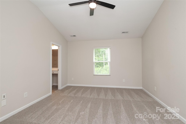 3349 Ellingford Rd, Charlotte, NC 28214 - unfurnished room with carpet, ceiling fan, baseboards, and vaulted ceiling