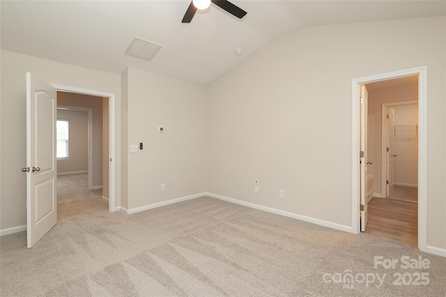 3349 Ellingford Rd, Charlotte, NC 28214 - unfurnished bedroom with light carpet, lofted ceiling, baseboards, and ceiling fan