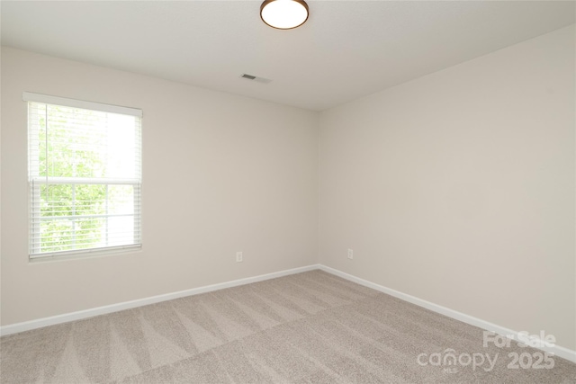 3349 Ellingford Rd, Charlotte, NC 28214 - carpeted spare room with baseboards