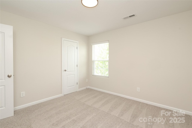3349 Ellingford Rd, Charlotte, NC 28214 - carpeted spare room with baseboards