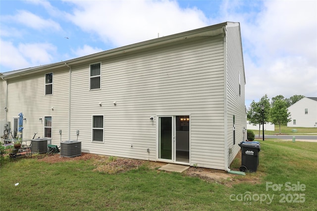 3349 Ellingford Rd, Charlotte, NC 28214 - rear view of property with a lawn and cooling unit