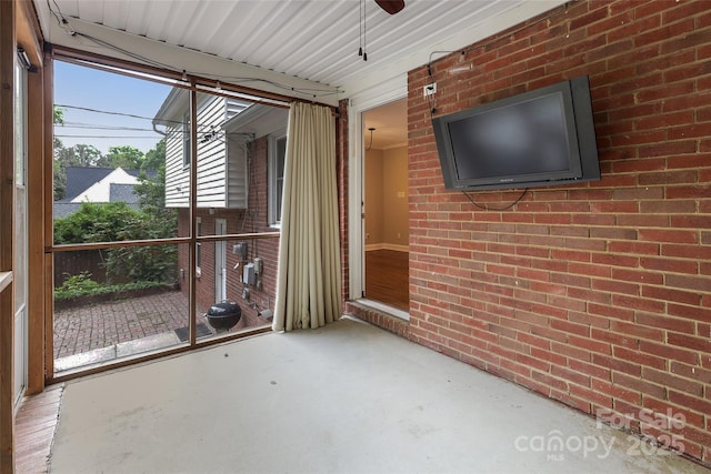 3624 Moultrie St, Charlotte, NC 28209 - unfurnished sunroom featuring ceiling fan