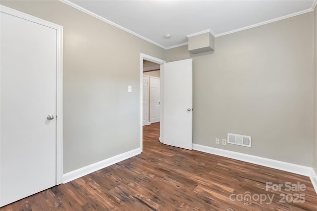 3624 Moultrie St, Charlotte, NC 28209 - unfurnished bedroom with ornamental molding, wood finished floors, and baseboards