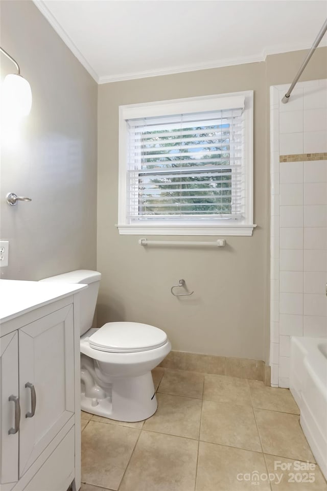 3624 Moultrie St, Charlotte, NC 28209 - bathroom with crown molding, toilet, vanity, washtub / shower combination, and tile patterned flooring