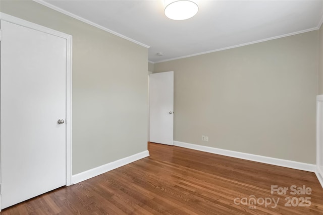 3624 Moultrie St, Charlotte, NC 28209 - unfurnished room featuring wood finished floors, ornamental molding, and baseboards
