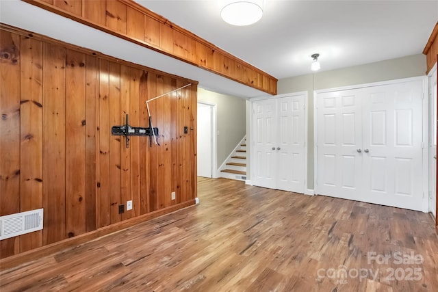 3624 Moultrie St, Charlotte, NC 28209 - basement with wood finished floors, stairway, and baseboards