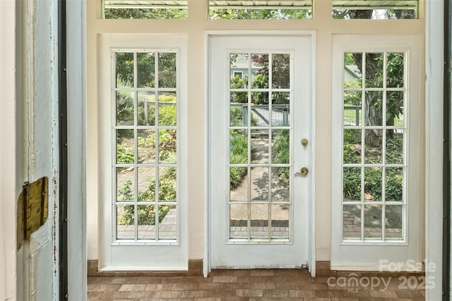 20 Kenilwood Pl, Asheville, NC 28803 - doorway to outside with brick patterned floors and healthy amount of natural light