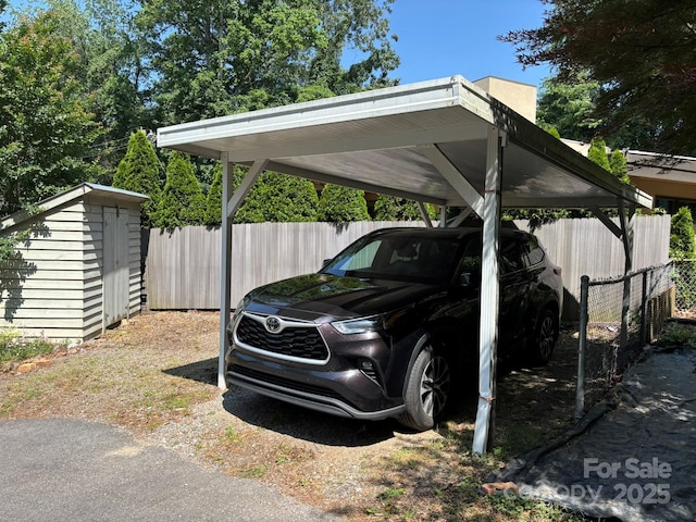 20 Kenilwood Pl, Asheville, NC 28803 - view of parking / parking lot featuring a detached carport