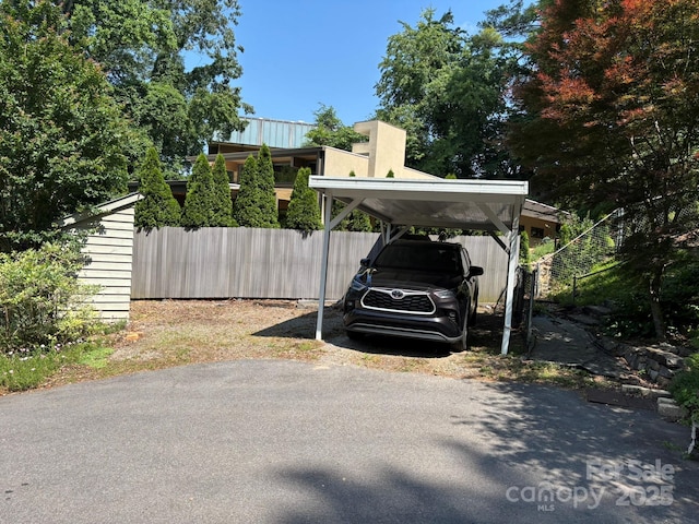 20 Kenilwood Pl, Asheville, NC 28803 - view of parking / parking lot with a detached carport and driveway