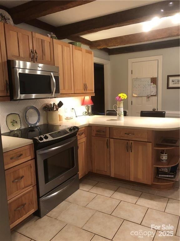 1619 Bellamy Cir, Albemarle, NC 28001 - kitchen featuring stainless steel appliances, beam ceiling, a peninsula, light countertops, and decorative backsplash