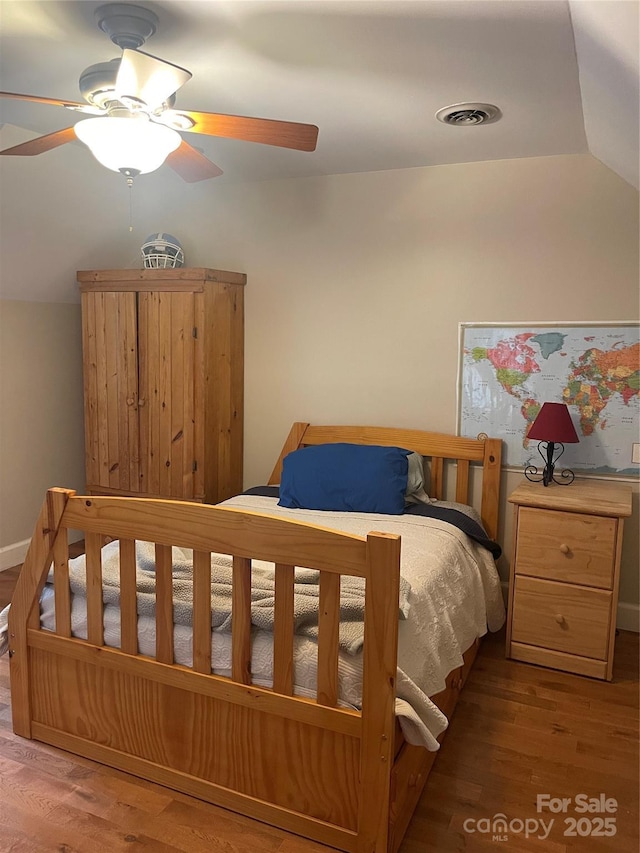 1619 Bellamy Cir, Albemarle, NC 28001 - bedroom with wood finished floors, a ceiling fan, and lofted ceiling