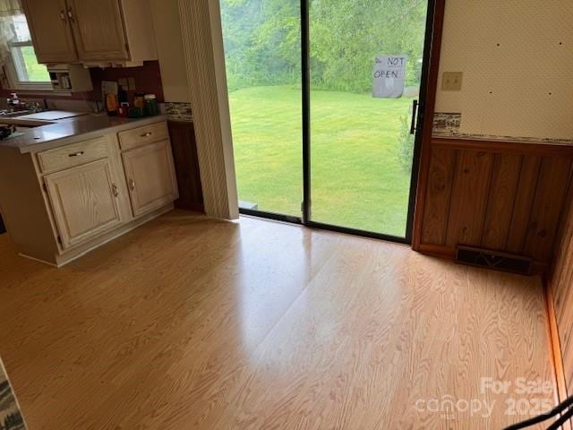 6561 Weldon Cir NW, Concord, NC 28027 - kitchen featuring light wood-type flooring and light countertops