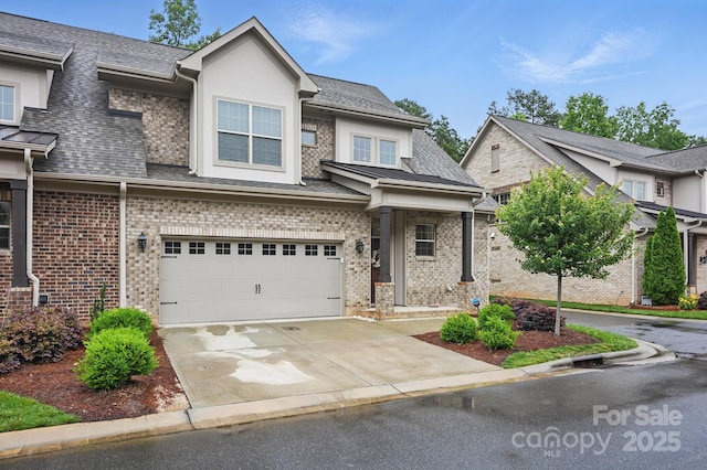 5118 Waldron Meadow Dr, Charlotte, NC 28226 - view of front facade with concrete driveway, brick siding, an attached garage, a shingled roof, and stucco siding