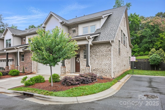 5118 Waldron Meadow Dr, Charlotte, NC 28226 - view of front of property featuring driveway, brick siding, an attached garage, a shingled roof, and stucco siding