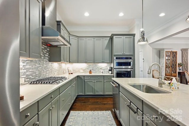 5118 Waldron Meadow Dr, Charlotte, NC 28226 - kitchen with wall chimney exhaust hood, a sink, dark wood-style floors, appliances with stainless steel finishes, and hanging light fixtures