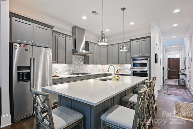 5118 Waldron Meadow Dr, Charlotte, NC 28226 - kitchen with appliances with stainless steel finishes, a sink, wall chimney exhaust hood, gray cabinetry, and recessed lighting
