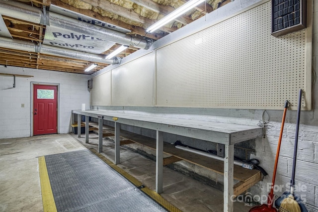 2653 Fairway Acres Cir, Lenoir, NC 28645 - unfinished below grade area with a workshop area and concrete block wall