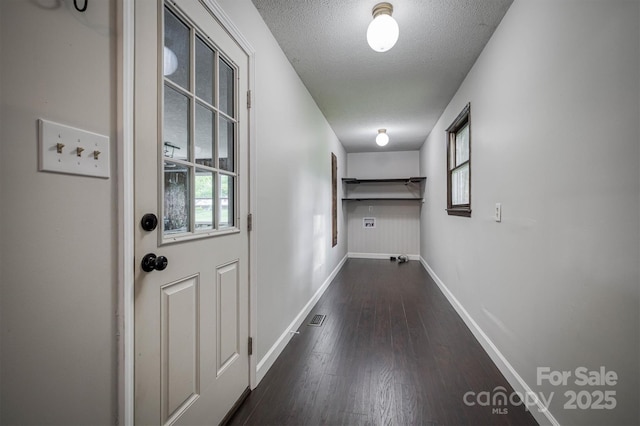 2653 Fairway Acres Cir, Lenoir, NC 28645 - hall with healthy amount of natural light, a textured ceiling, and dark wood finished floors