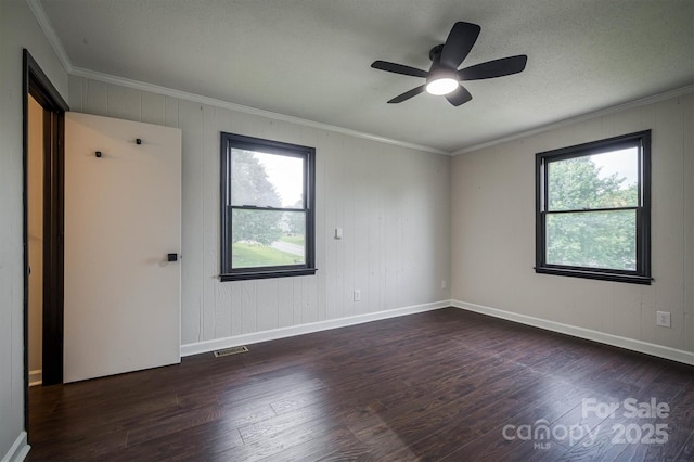 2653 Fairway Acres Cir, Lenoir, NC 28645 - unfurnished room featuring ornamental molding, wood finished floors, plenty of natural light, and ceiling fan