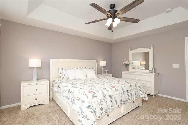 2018 Rosewater Ln, Indian Trail, NC 28079 - bedroom featuring light carpet, baseboards, and a tray ceiling