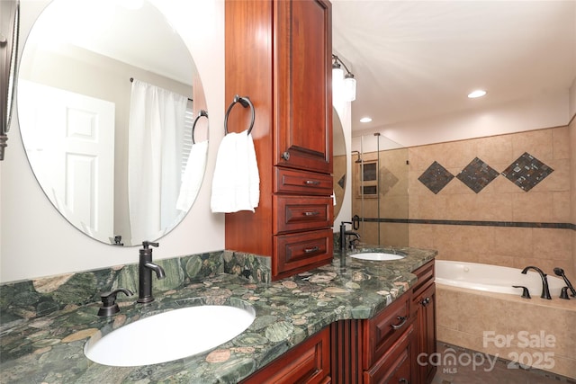 2018 Rosewater Ln, Indian Trail, NC 28079 - full bath with a garden tub, double vanity, and recessed lighting