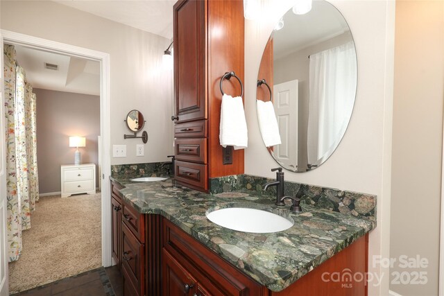 2018 Rosewater Ln, Indian Trail, NC 28079 - full bathroom with double vanity and baseboards