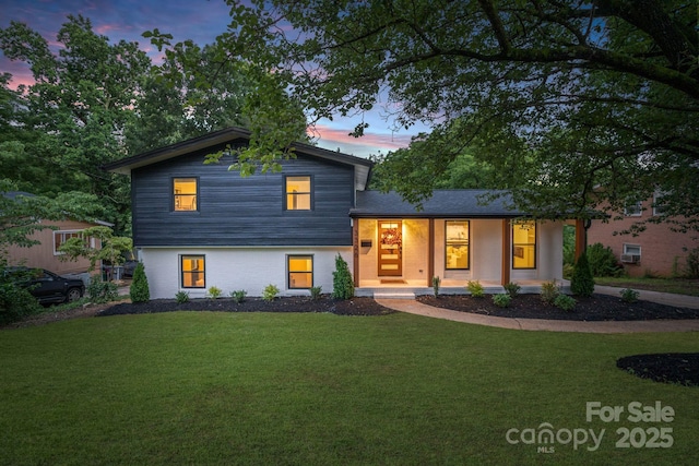 3326 Winterfield Pl, Charlotte, NC 28205 - split level home with a yard and covered porch